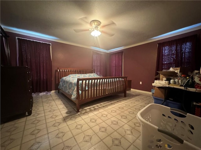 bedroom with a textured ceiling, ceiling fan, and crown molding