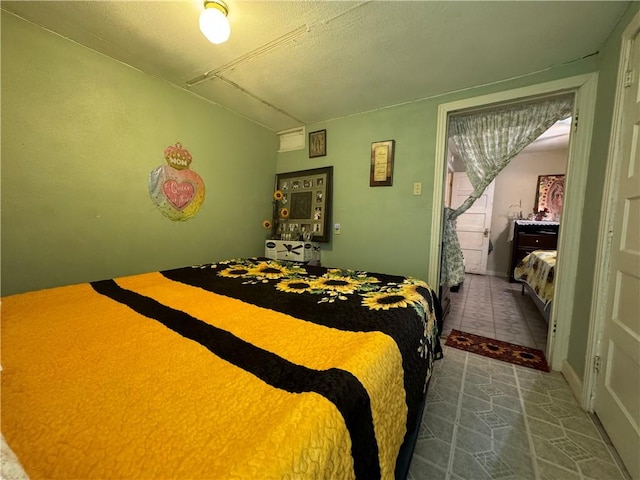 bedroom featuring dark tile patterned flooring