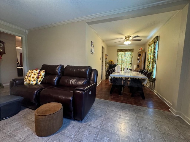 living room with ceiling fan, wood-type flooring, and ornamental molding