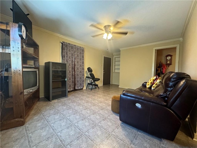 living room featuring ceiling fan and ornamental molding