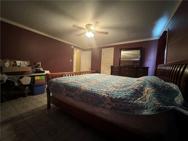 tiled bedroom featuring ceiling fan, a textured ceiling, and ornamental molding