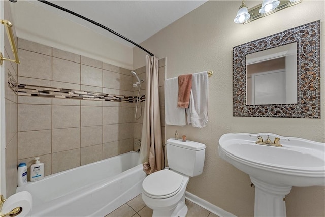 bathroom featuring toilet, shower / bath combination with curtain, and tile patterned floors