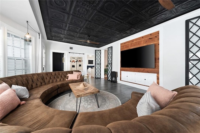 living room featuring hardwood / wood-style flooring and ceiling fan