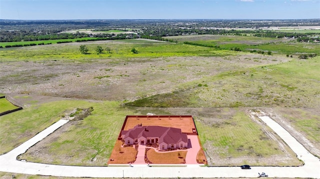 birds eye view of property featuring a rural view