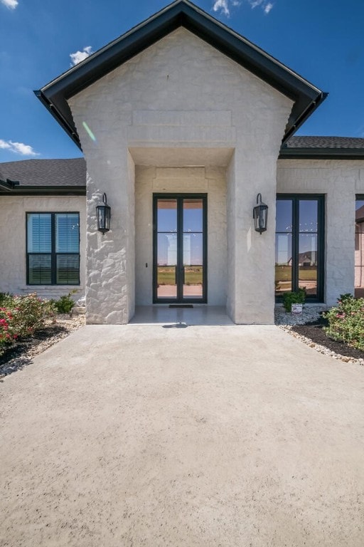 doorway to property with french doors