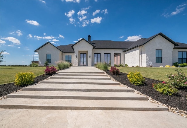 view of front of house with a front yard