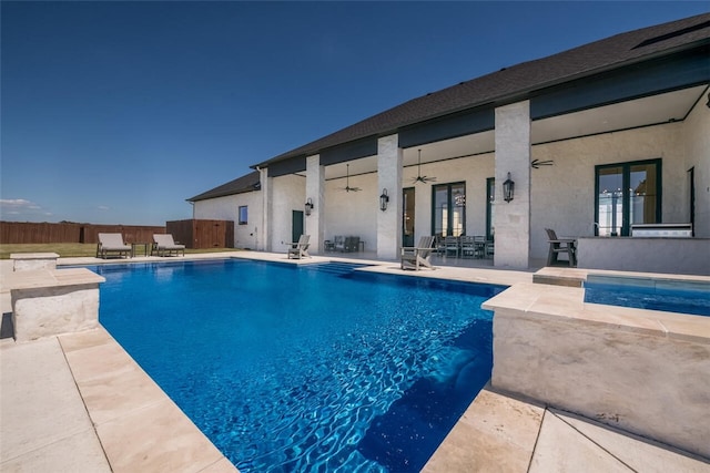 view of pool featuring ceiling fan and a patio area