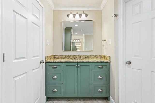 bathroom with vanity and ornamental molding