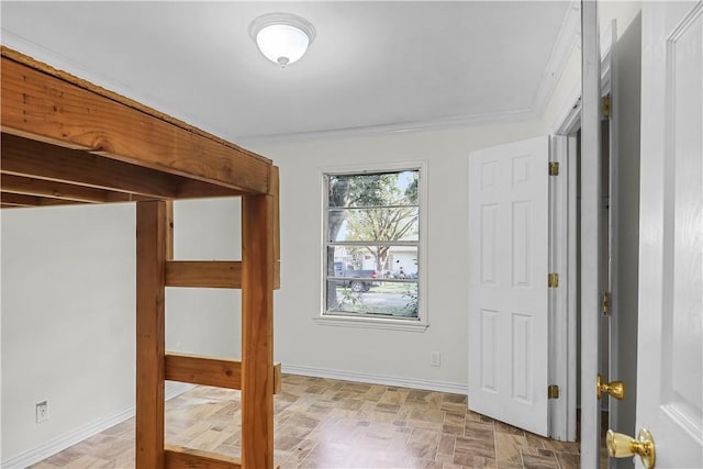 interior space with crown molding