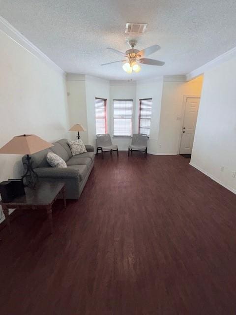 living room featuring dark wood-type flooring and ceiling fan