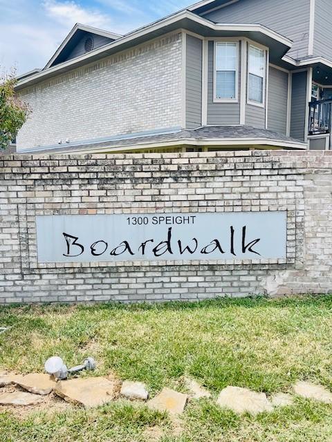 view of community sign