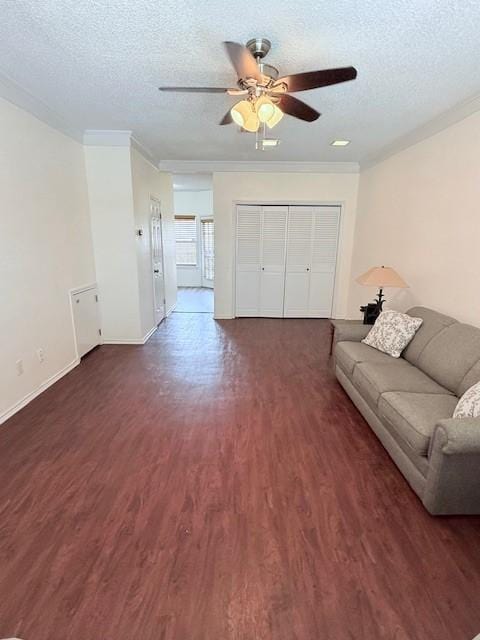 living room with dark hardwood / wood-style floors and ceiling fan