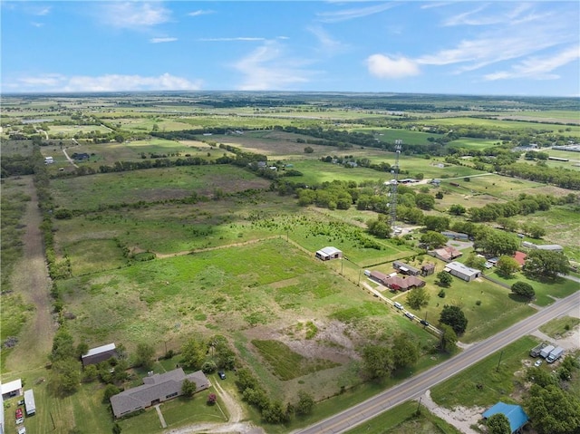 birds eye view of property featuring a rural view