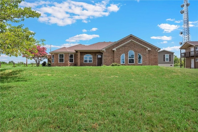 single story home with a front yard