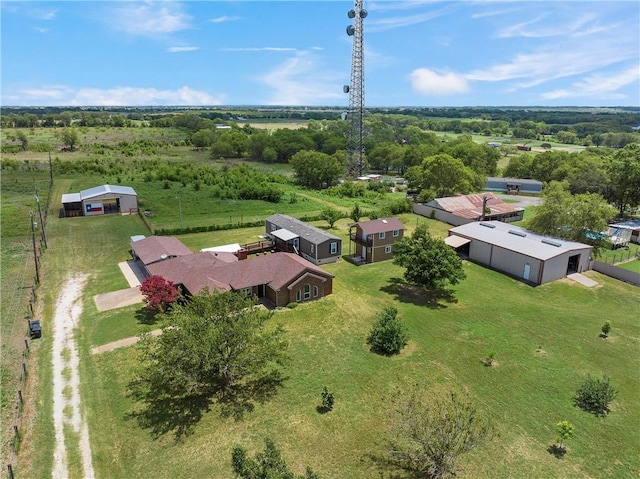 birds eye view of property featuring a rural view