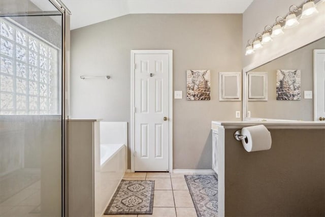 bathroom featuring tile patterned flooring, plus walk in shower, and vaulted ceiling