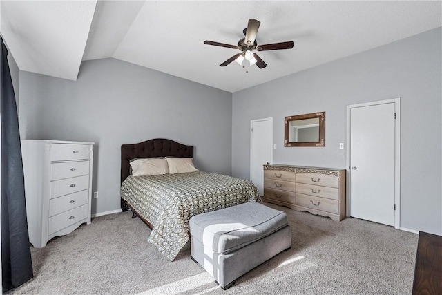 bedroom featuring carpet, ceiling fan, and lofted ceiling