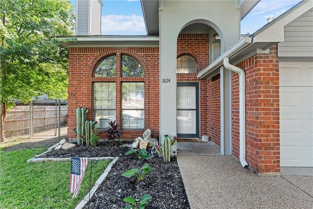 entrance to property featuring a garage