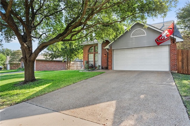 single story home with a garage and a front lawn