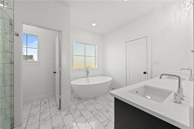 bathroom featuring vanity and shower with separate bathtub