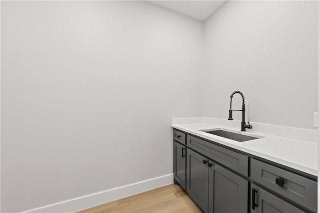 bathroom featuring vanity and hardwood / wood-style flooring