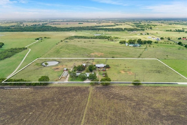 birds eye view of property featuring a rural view