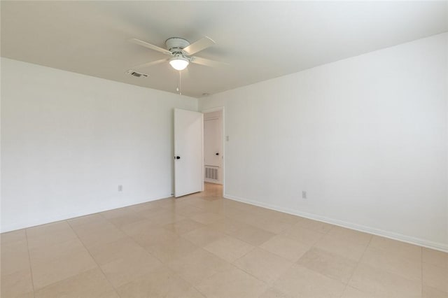 unfurnished room with ceiling fan