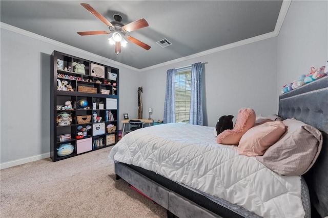 bedroom with ceiling fan, carpet floors, and ornamental molding