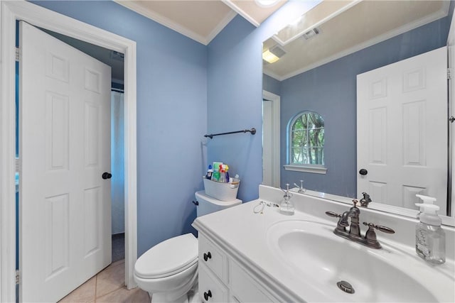 bathroom with tile patterned floors, toilet, vanity, and ornamental molding