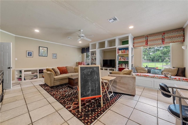 tiled living room featuring ceiling fan and crown molding