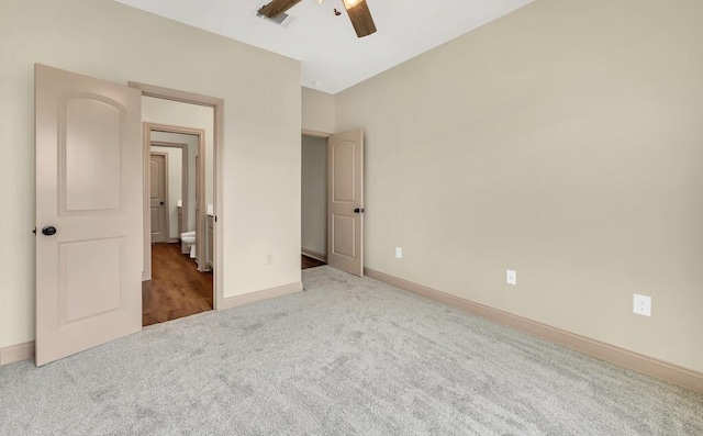 unfurnished bedroom featuring carpet flooring and ceiling fan