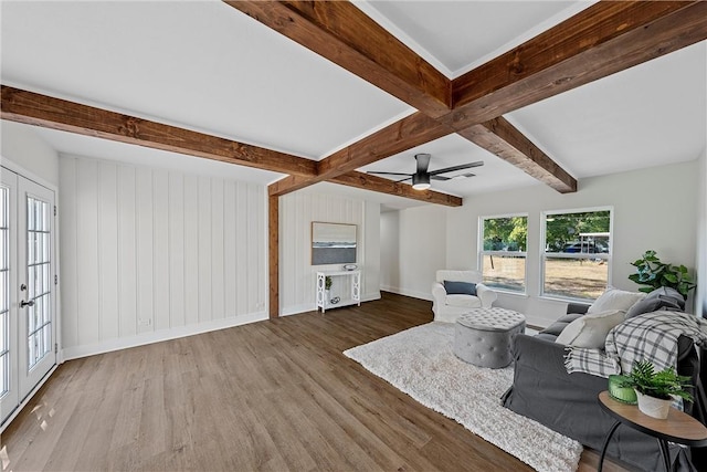 unfurnished living room featuring beam ceiling, ceiling fan, french doors, and wood-type flooring