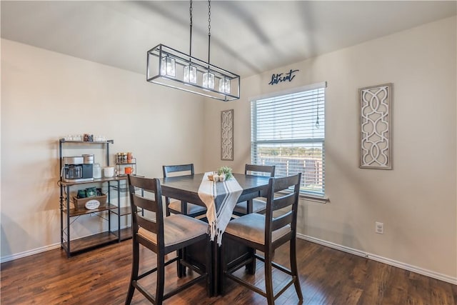 dining area with dark wood-type flooring