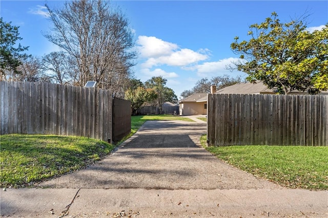 view of road featuring driveway