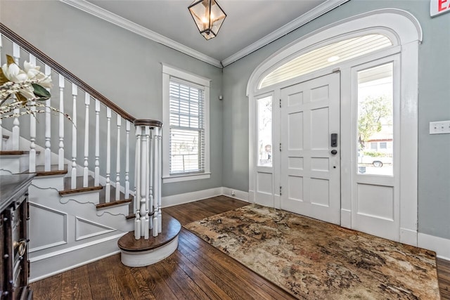 entryway featuring crown molding and wood-type flooring