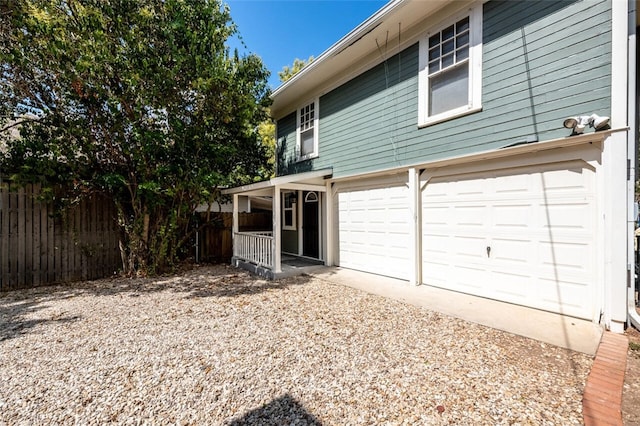 exterior space with a garage