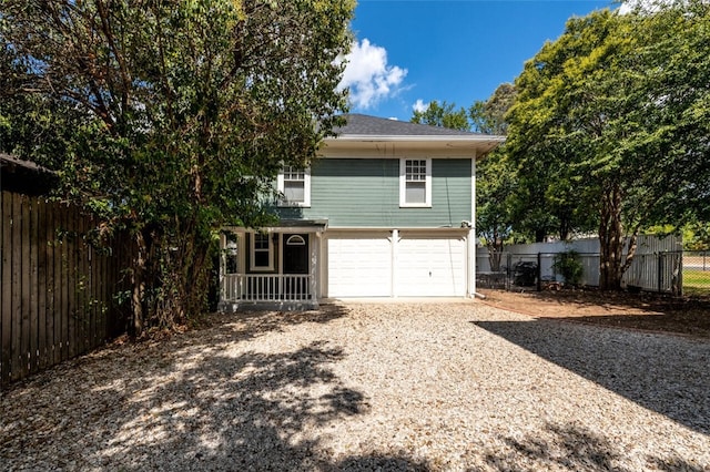 view of side of home featuring a garage