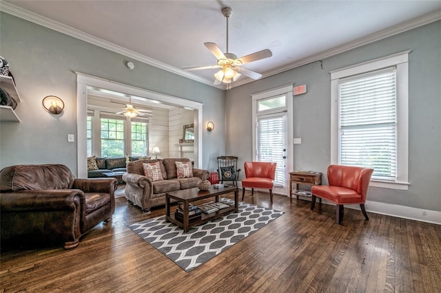 living room featuring ornamental molding, dark hardwood / wood-style floors, and ceiling fan