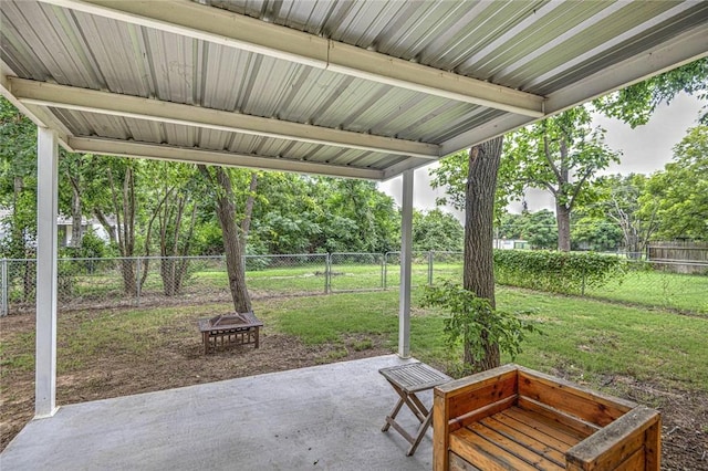 view of patio / terrace with an outdoor fire pit