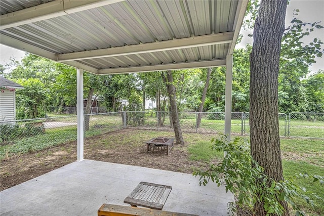 view of patio featuring an outdoor fire pit