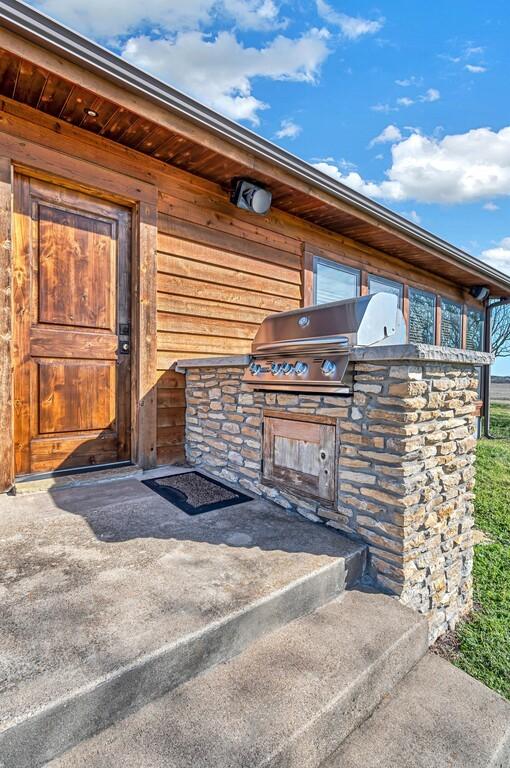 exterior space with an outdoor kitchen