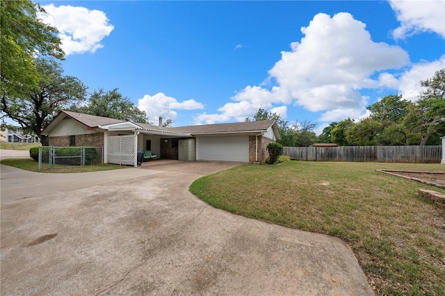 view of front of property with a front lawn and a garage