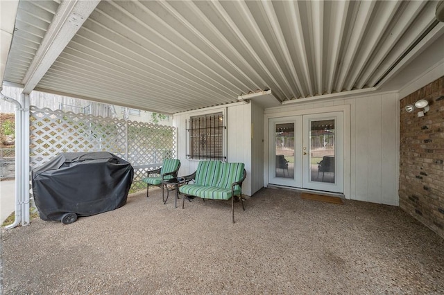 view of patio / terrace with area for grilling and french doors