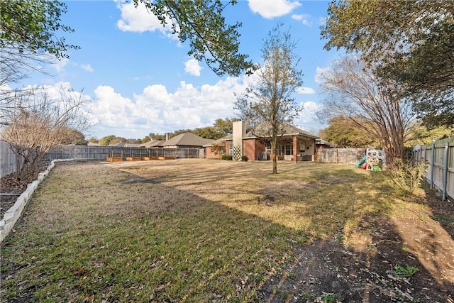 view of yard featuring a playground