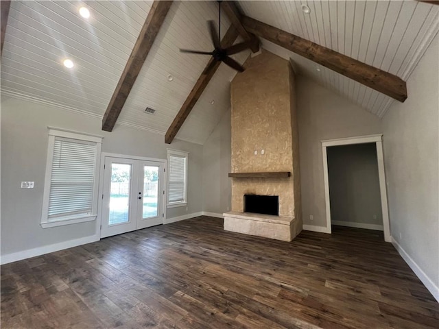 unfurnished living room with french doors, ceiling fan, wooden ceiling, beamed ceiling, and dark hardwood / wood-style floors