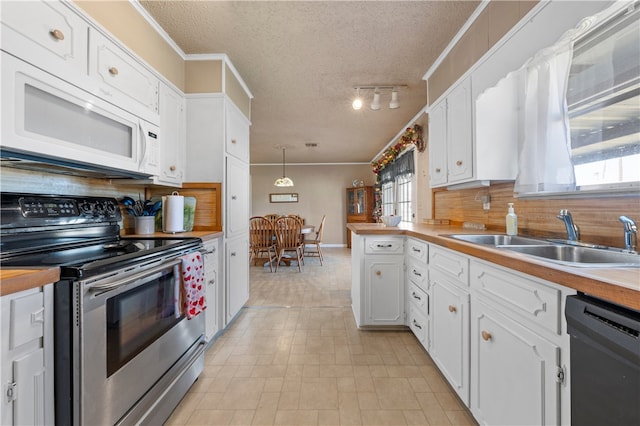 kitchen with dishwasher, sink, white cabinets, hanging light fixtures, and stainless steel electric range