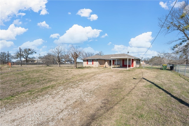 view of yard with a rural view