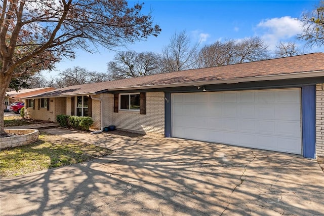 single story home with a garage