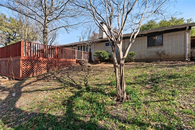 view of yard featuring a deck