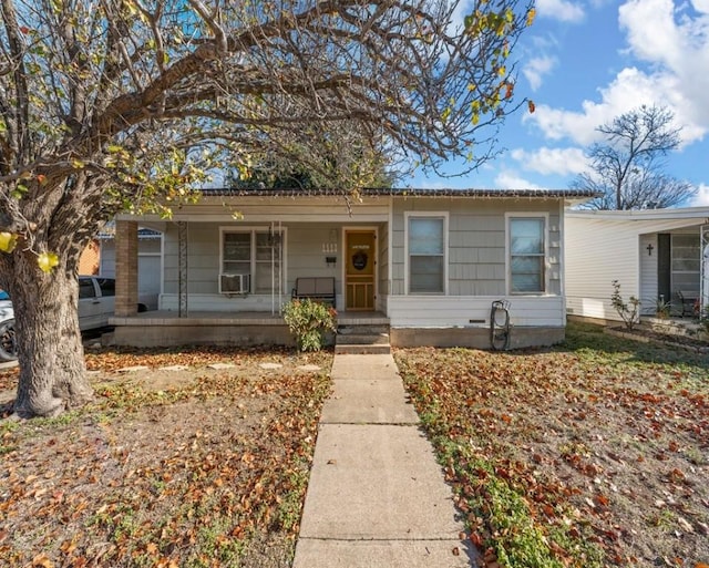 view of front of property featuring cooling unit